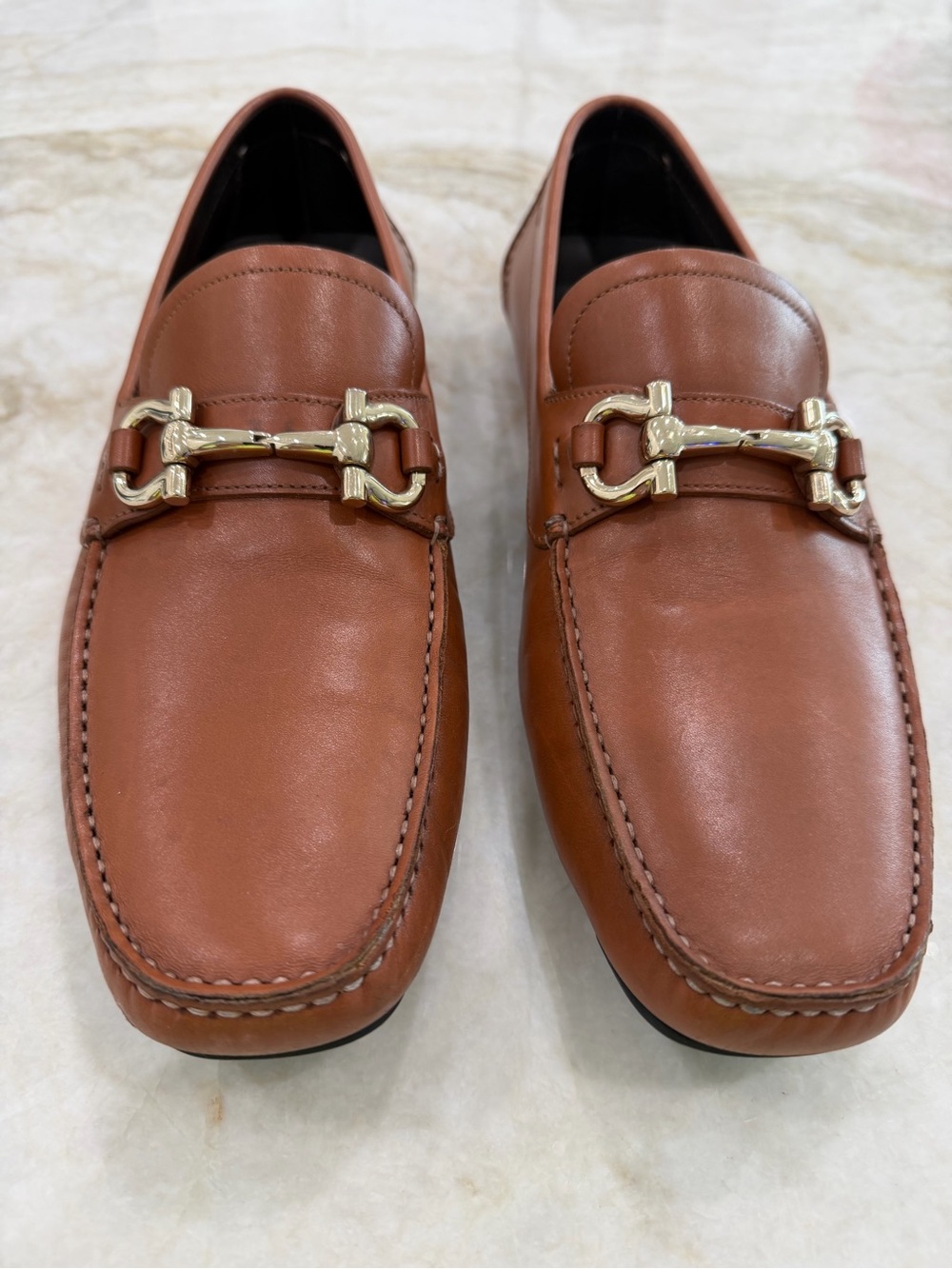 Mens Ferragamo Gancini Ornament Driver shoe in natural brown.